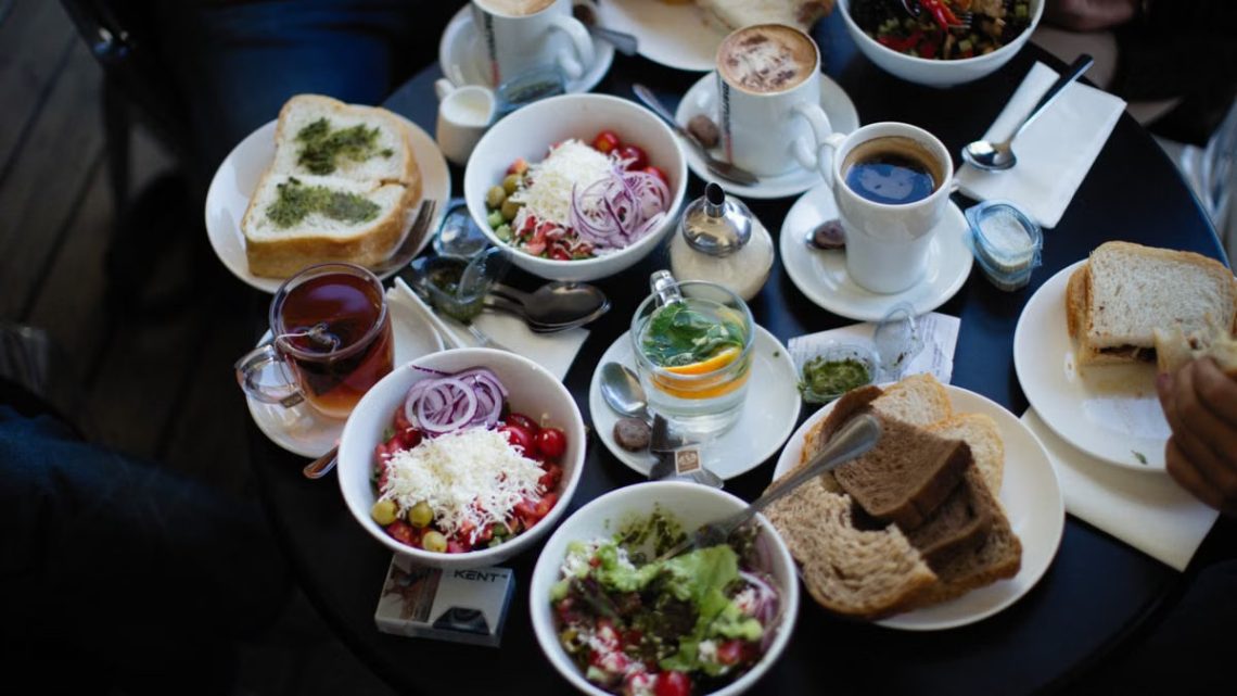Top view of diverse breakfast options on a table, perfect for foodies.